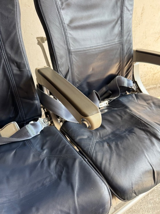 Image 1 of Vintage driepersoons vliegtuigstoelen - Recaro
