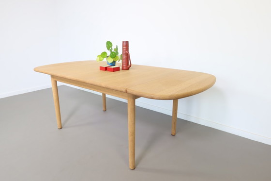 Image 1 of Getama eiken drop-leaf salontafel ,model nr GE 82/85 , ontworpen door Hans Wegner