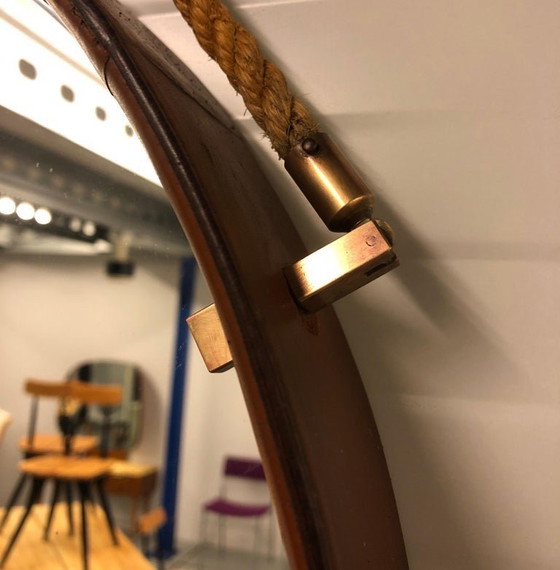 Image 1 of https://www.1stdibs.com/furniture/mirrors/wall-mirrors/pizzetti-cognac-leather-mirror-1950s-italy/id-f_33697732/