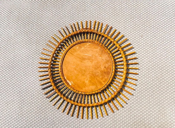 Image 1 of Large rattan sun mirror 68 cm. Vintage 70s