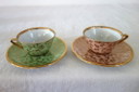 6 tazze e piattini vintage di Limoges con decorazioni floreali e dorate.
