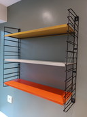 Vintage Tomado wall rack