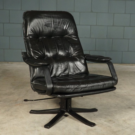 Image 1 of Vintage Unico draaifauteuil met hocker – jaren 70