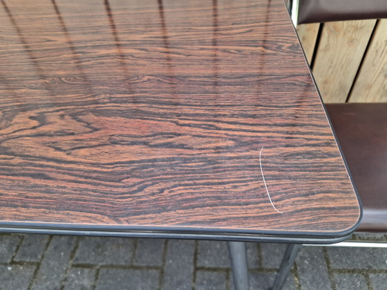 Image 1 of Vintage kitchen table with 2 chairs. 1960s