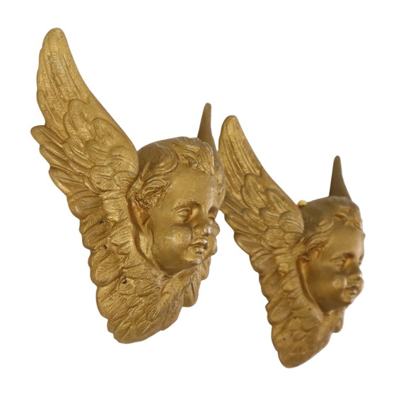 Image 1 of Teste d'angelo in metallo dorato