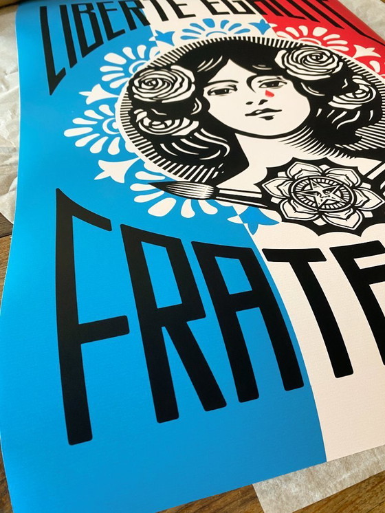 Image 1 of Liberté, Égalité, Fraternité - Emblematic poster by Shepard Fairey 50x70 cm
