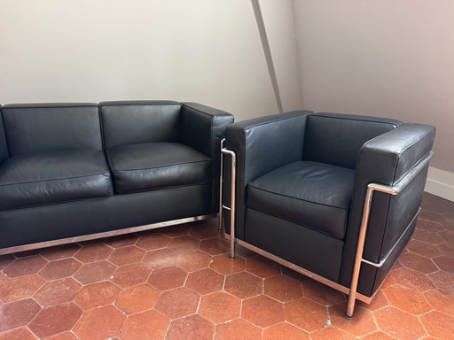 Designer-Wohnzimmergarnitur – Schwarzes Leder & Stahl