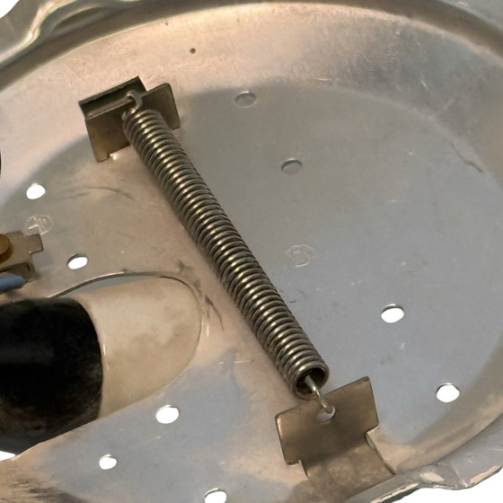 Image 1 of Art deco style lamp made from a metal base that houses an opaline dome. The dome is secured in place with a spring mechanism mak