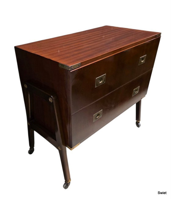 Image 1 of 2294 Vintage wooden cabinet with brass details and wheels