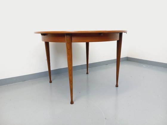 Image 1 of Vintage Scandinavian style round teak dining table from the 1950s/60s with extension