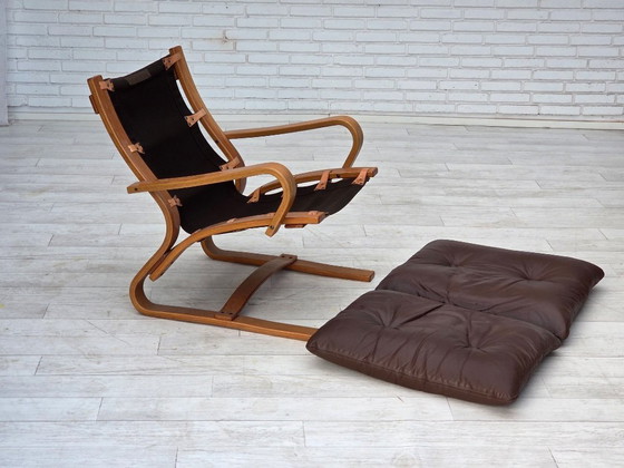 Image 1 of Fauteuil danois des années 1970 de la marque Komfort, cuir, toile et bois courbé.
