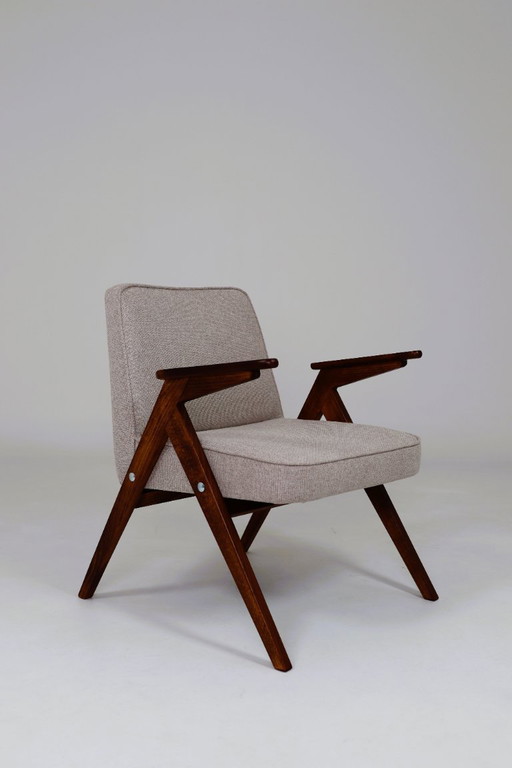Vintage armchair, after renovation, beige upholstery, dark walnut color wood, Scandinavian design