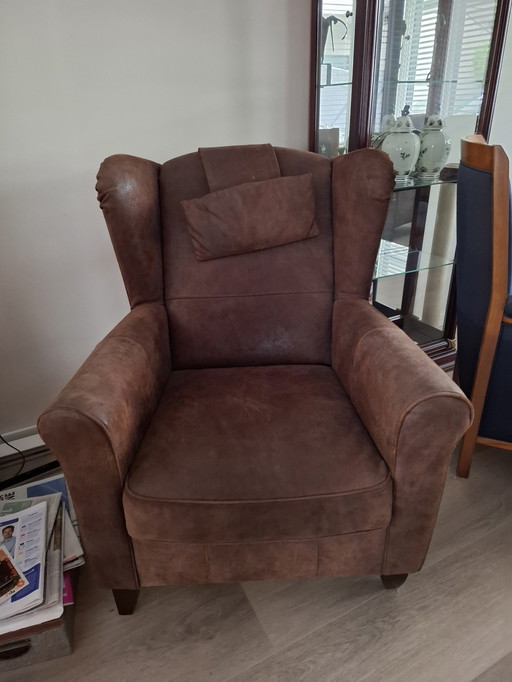 2 fauteuils en cuir brut marron