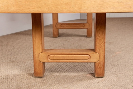 Image 1 of Gran mesa de comedor extensible de roble macizo, diseñada por Guillermo y Chambron en 1960.