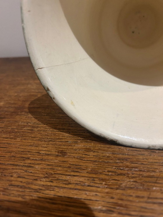 Image 1 of black and white vase from the 1950s