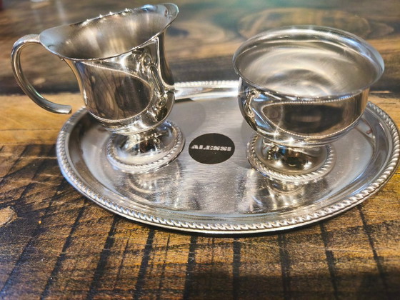 Vintage Alfra Alessi 3-delige roestvrijstalen melkkan- en suikerpotset met dienblad, jaren 50/60. (photo 2 of 5)
