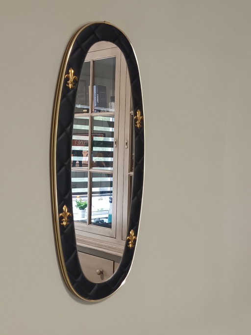 Specchio ovale vintage nero e oro