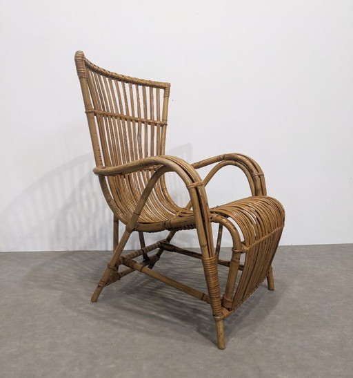 Fauteuil vintage en rotin.  70s.