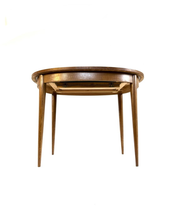 Image 1 of Vintage extendable teak dining table '60