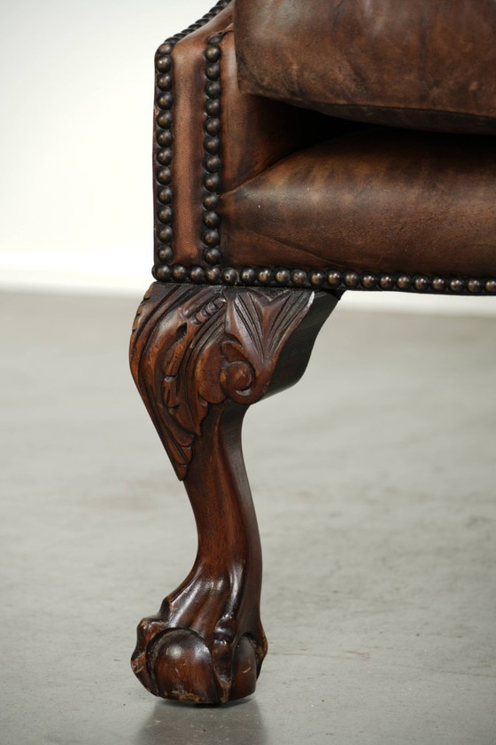 Charaktervoller alter englischer Chesterfield Ohrensessel aus Rindsleder mit schöner Patina und Details (photo 13 of 13)