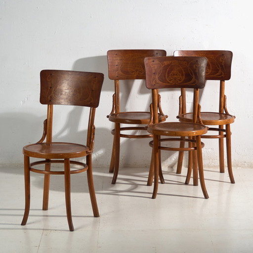 Antique set of 4 Viennese café bentwood chairs with decorative back panel – Central Europe, circa 1900
