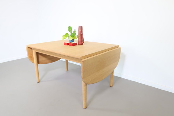 Image 1 of Getama eiken drop-leaf salontafel ,model nr GE 82/85 , ontworpen door Hans Wegner