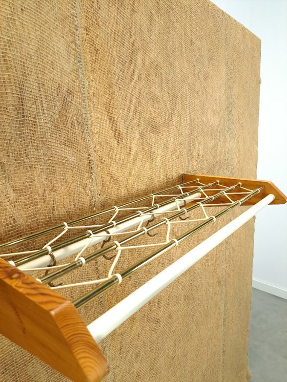 Image 1 of Coat rack from Sweden gold with wood, no. 11