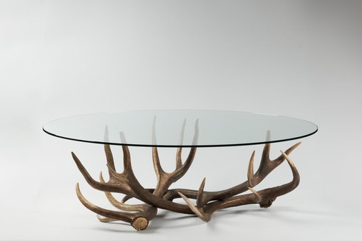 Mesa de centro de cuerno con estante de cristal transparente