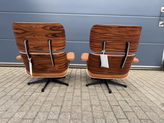 Image 1 of 2 poltrone lounge Vitra Eames XL originali con poggiapiedi, in pregiata pelle color cognac e palissandro Santos, NUOVE!!