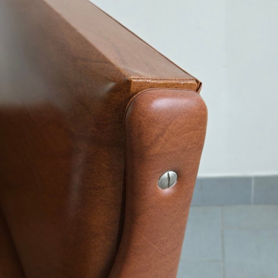 Image 1 of Poltrona francese vintage anni '60 in similpelle color avana e legno laccato nero.