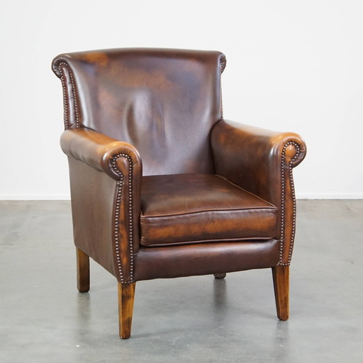 Fauteuil/chaise en cuir de boeuf marron foncé