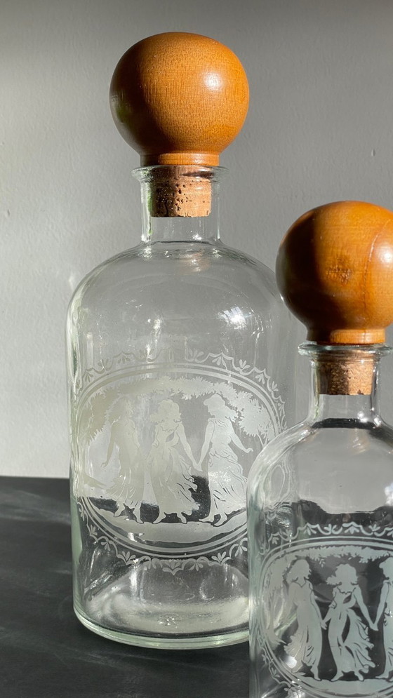 Image 1 of Vintage Engraved Glass and Wood Bottles