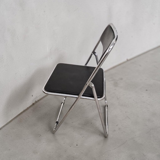 Image 1 of Set van 4 opklapbare stoelen in chroom- en leerstijl uit het midden van de 20e eeuw, Italië, jaren 70.