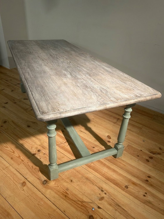 Image 1 of Landelijke vintage boerentafel met groen onderstel in eik