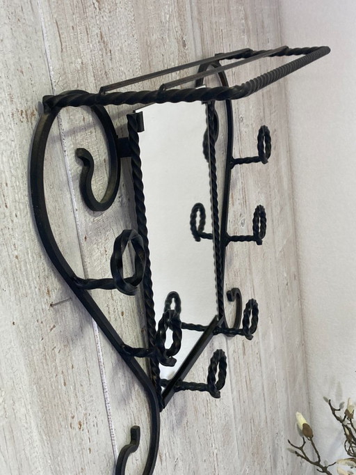 Wrought iron wall-mounted coat rack