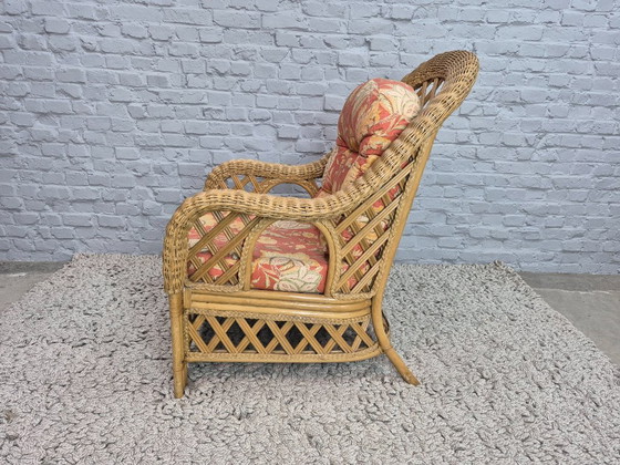 Image 1 of Luxurious Vintage Bamboo & Rattan Armchair with Floral Cushions – Warm Terracotta Tones