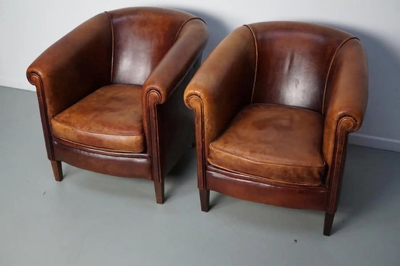 Image 1 of Vintage Nederlandse clubfauteuils van cognackleurig leer, set van 2
