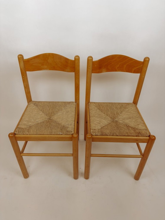 Image 1 of 2x houten Scandinavische eetkamerstoelen met biezen zitting