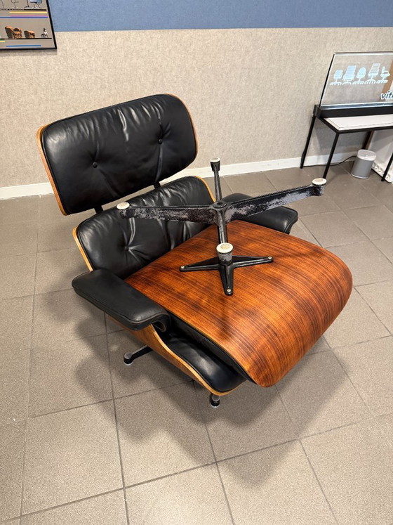 Image 1 of Herman Miller / Contura | Charles & Ray Eames | Lounge Chair & Ottoman | Rosewood & Black Leather | 1x Set