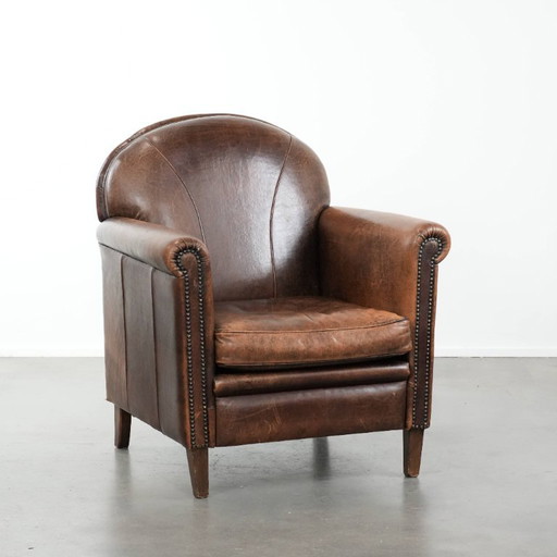 Poltrona vintage in pelle di pecora con carattere