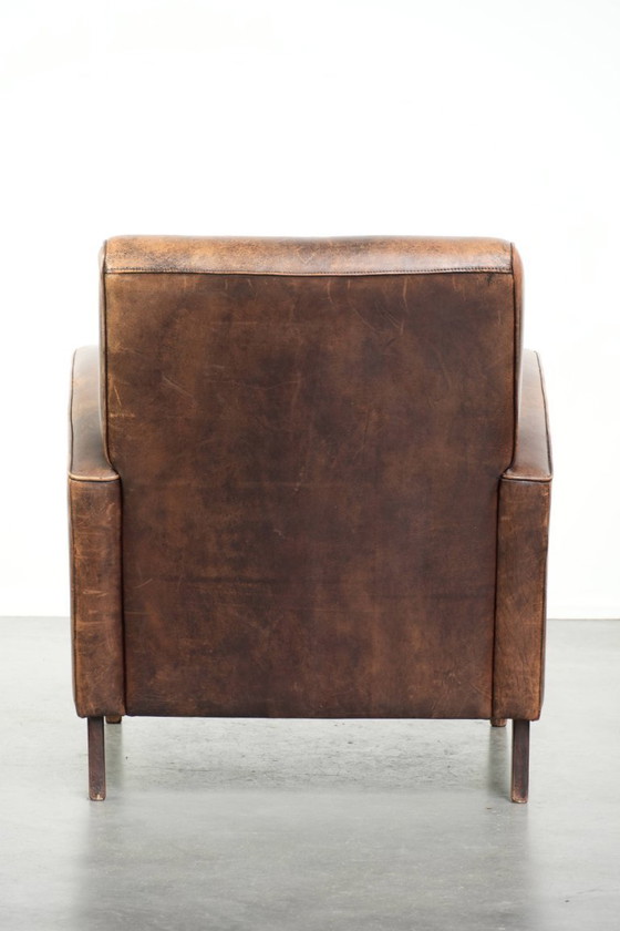 Image 1 of Sessel aus Schaffellleder mit wunderschönem, zeitlosem Design und herrlich warmen Farben