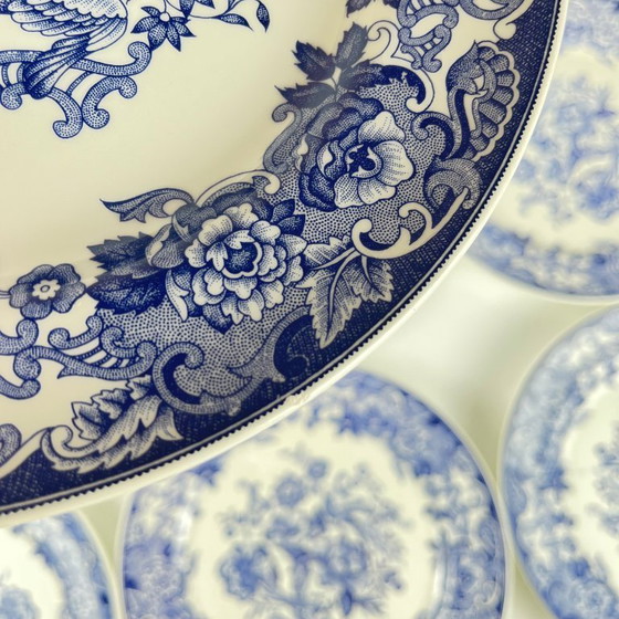 Image 1 of Set of 8 blue earthenware dinner plates with floral and bird decoration, early 20th century