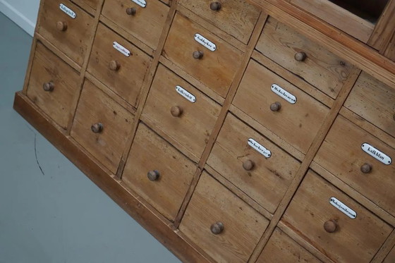 Image 1 of Large antique German apothecary cabinet / display cabinet in pine, early 20th century