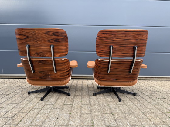 Image 1 of 2 poltrone lounge Vitra Eames XL originali con poggiapiedi, in pregiata pelle color cognac e palissandro Santos, NUOVE!!