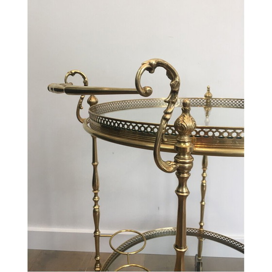 Image 1 of Vintage brass and glass table on wheels, 1940