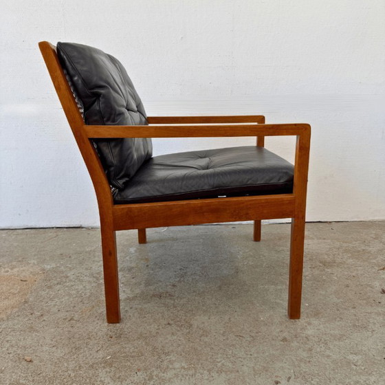 Image 1 of Midcentury fauteuil - hout, webbing - zwart lederen kussens