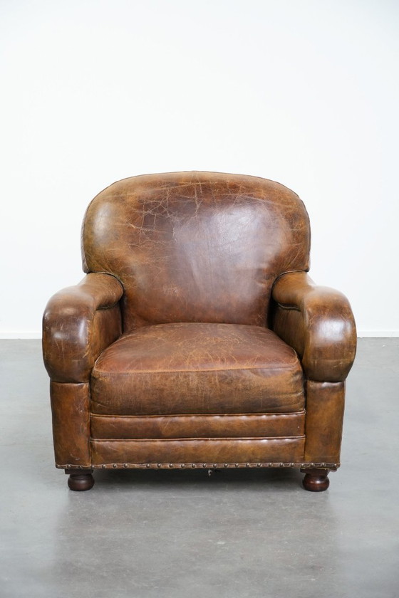 Image 1 of Vintage generfde rundleren fauteuil met ronde vormen
