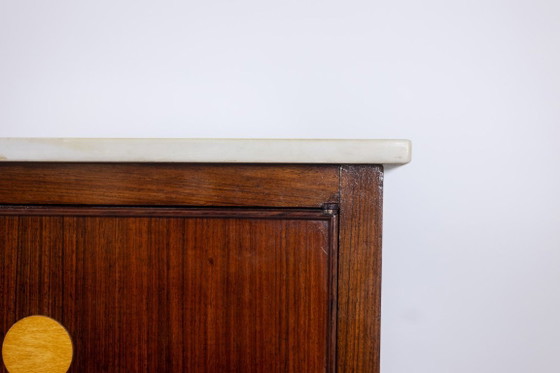 Image 1 of Een trompe-l'oeil dressoir van palissanderhout. Jaren 50.