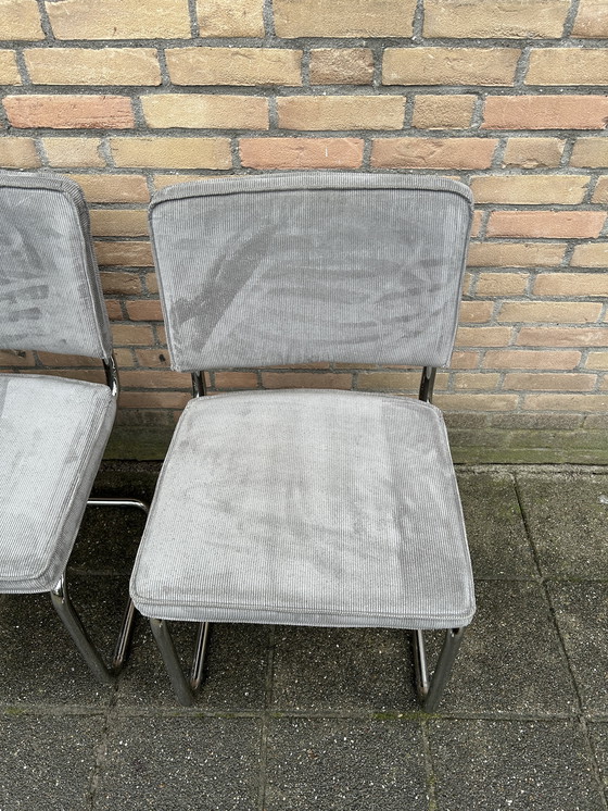 Image 1 of 4 sillas de tela acanalada pura con estructura tubular cromada