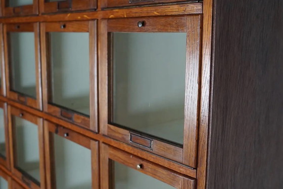 Image 1 of Antique large Dutch oak haberdashery cabinet with hinged doors, 1920s/30s